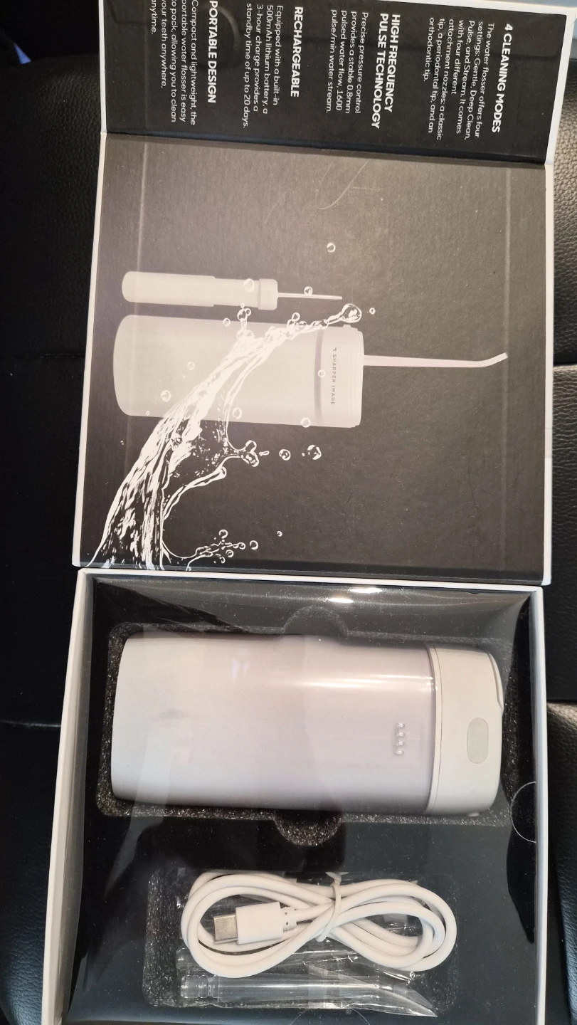 Sharper Image Portable Cordless Oral Irrigator - photo 2