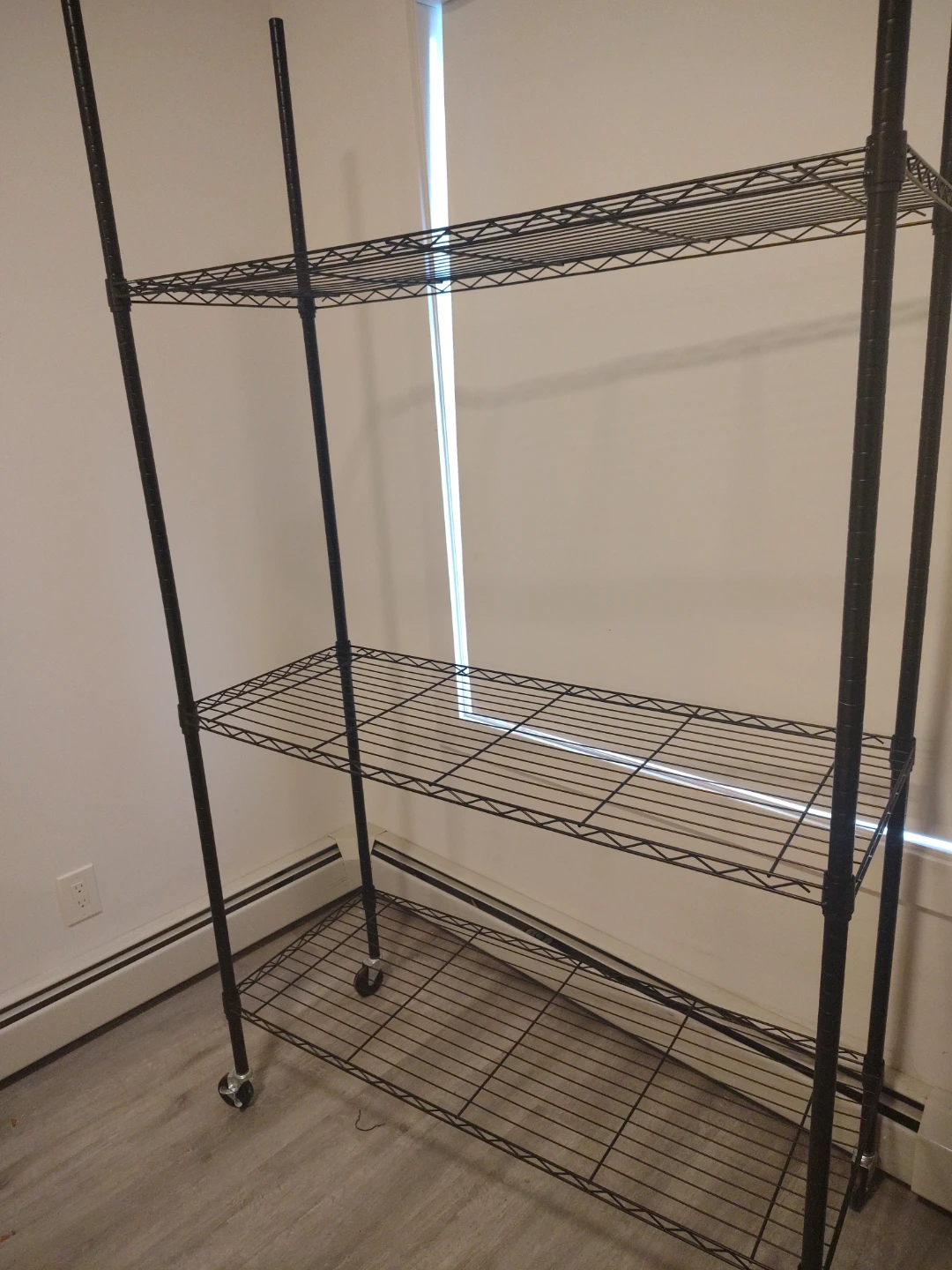 Black Wire Shelving Unit disassembled