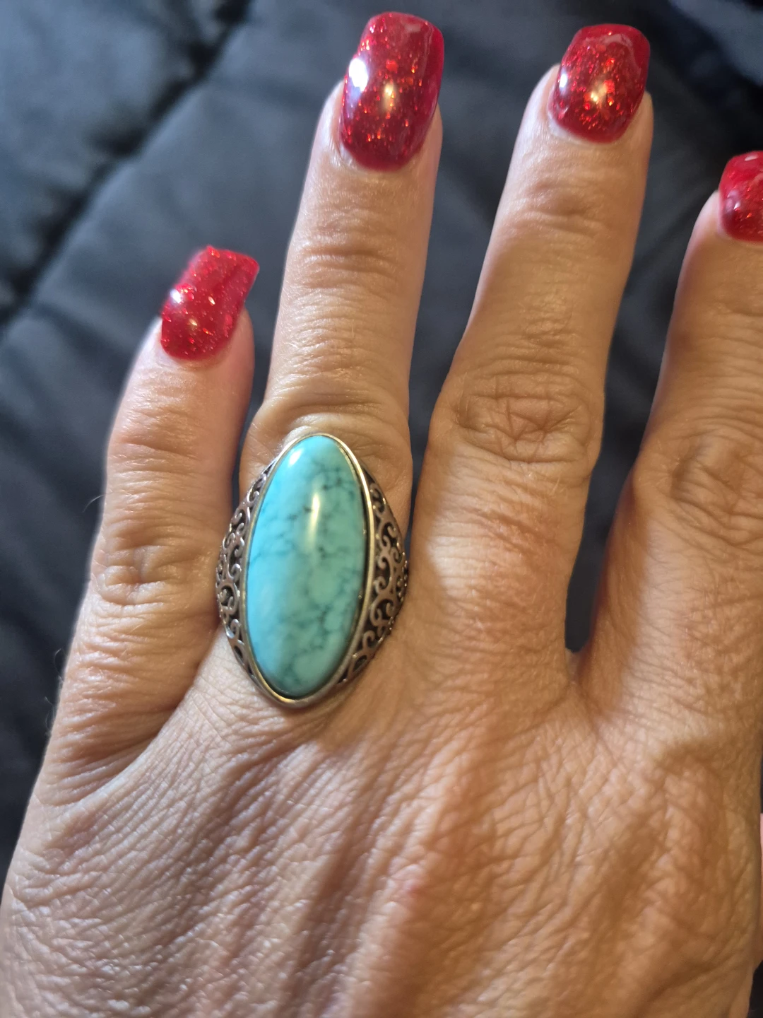 Turquoise oval ring with filigree band