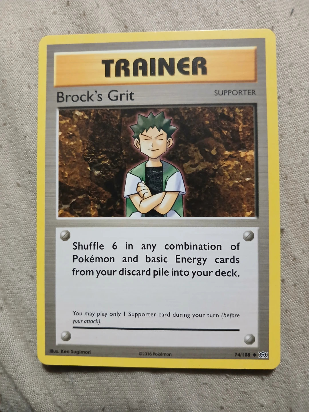 Brock's Grit Trainer 74/108 2016 Pokémon Card