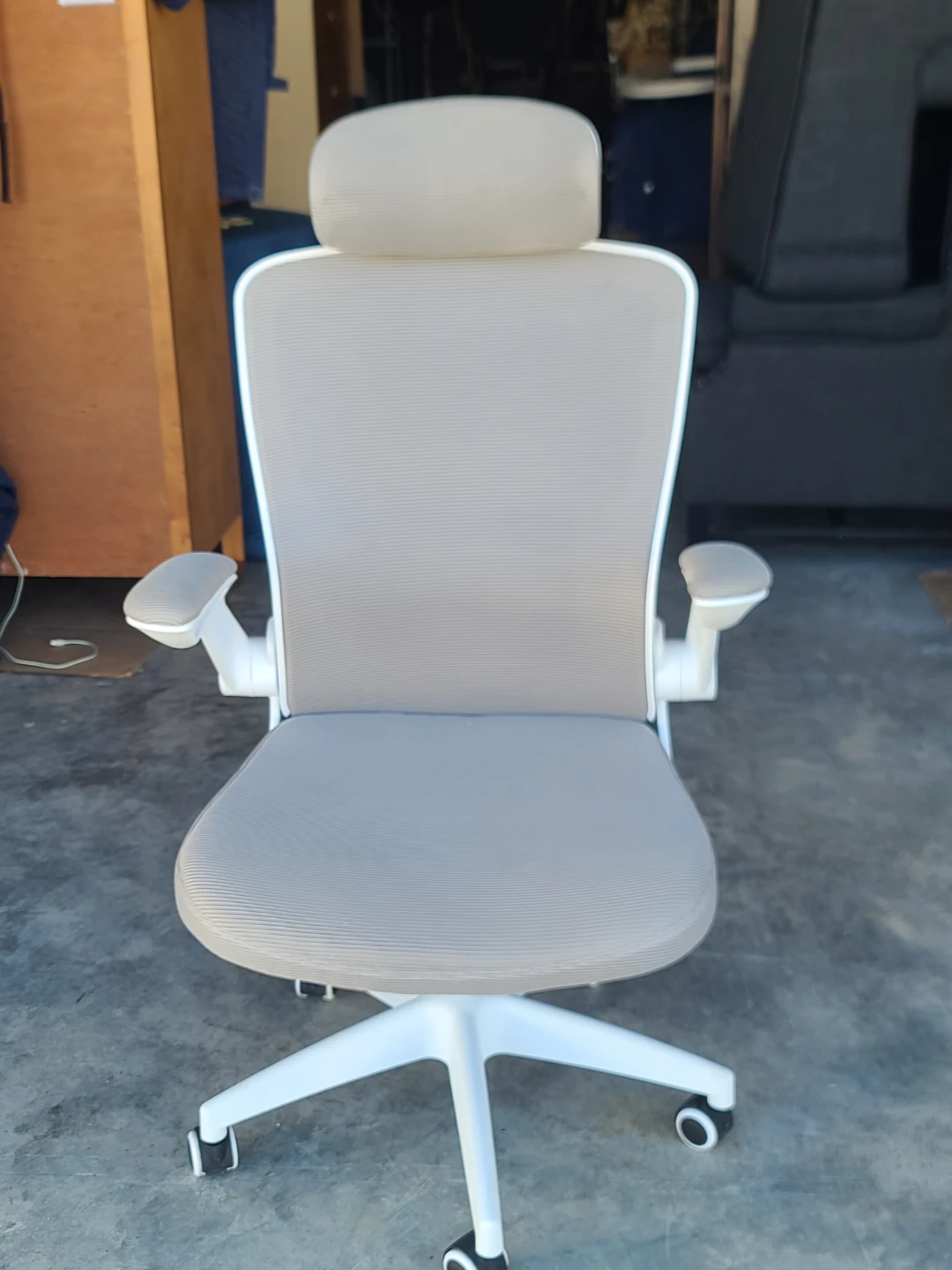 White ergonomic office chair with headrest