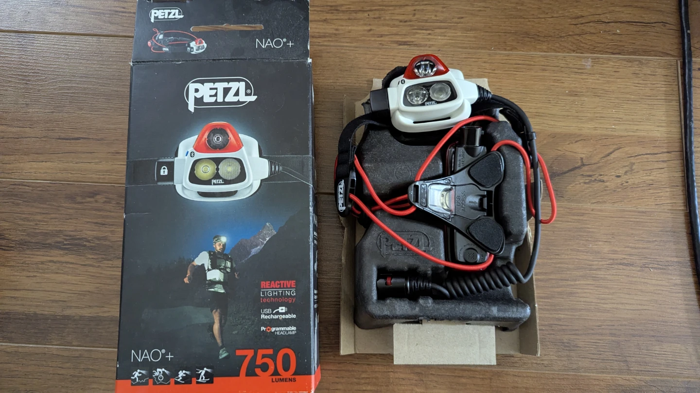 Petzl Nao + headlamp 750 lumens brand new open box