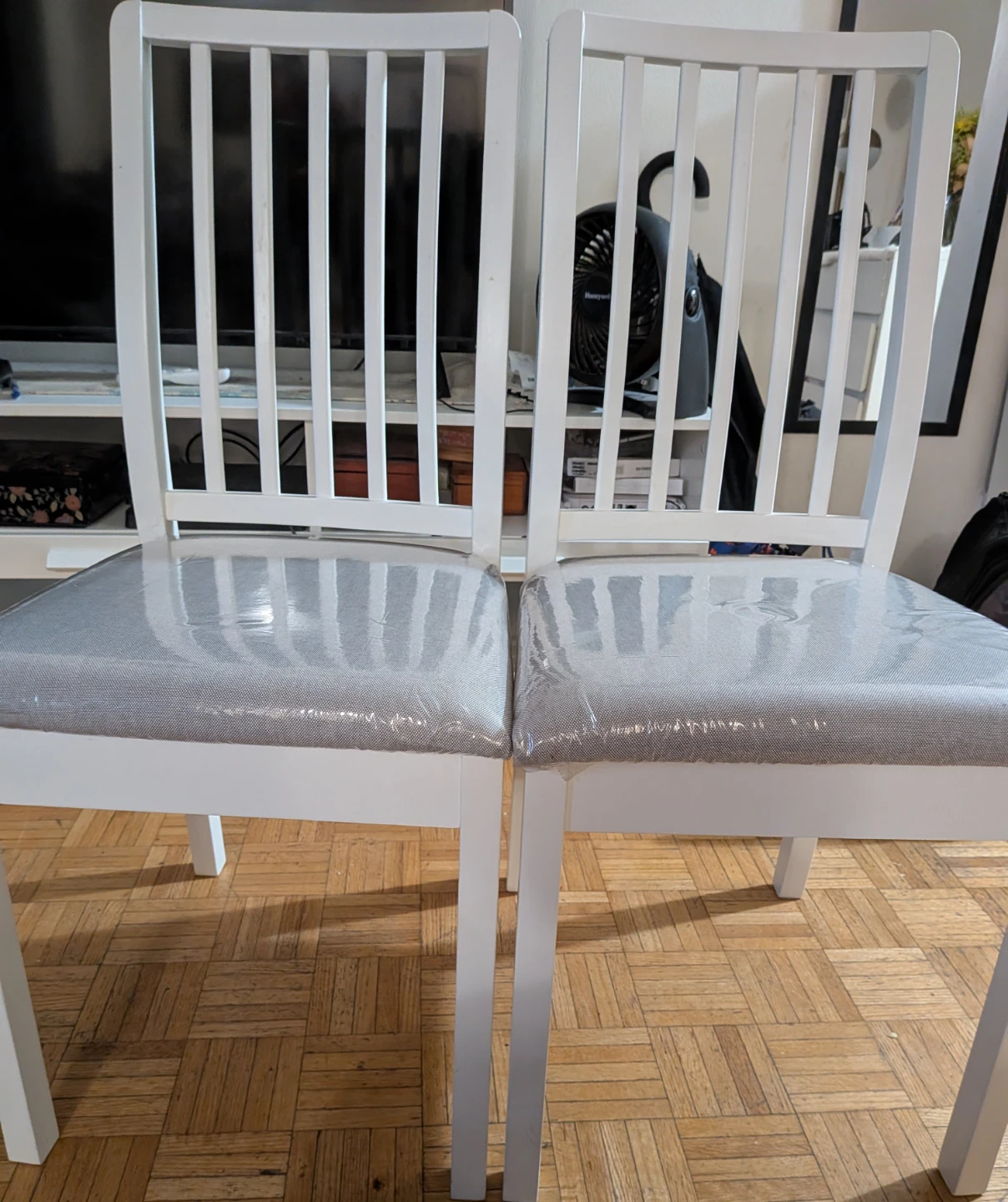 Set of two white dining chairs IKEA