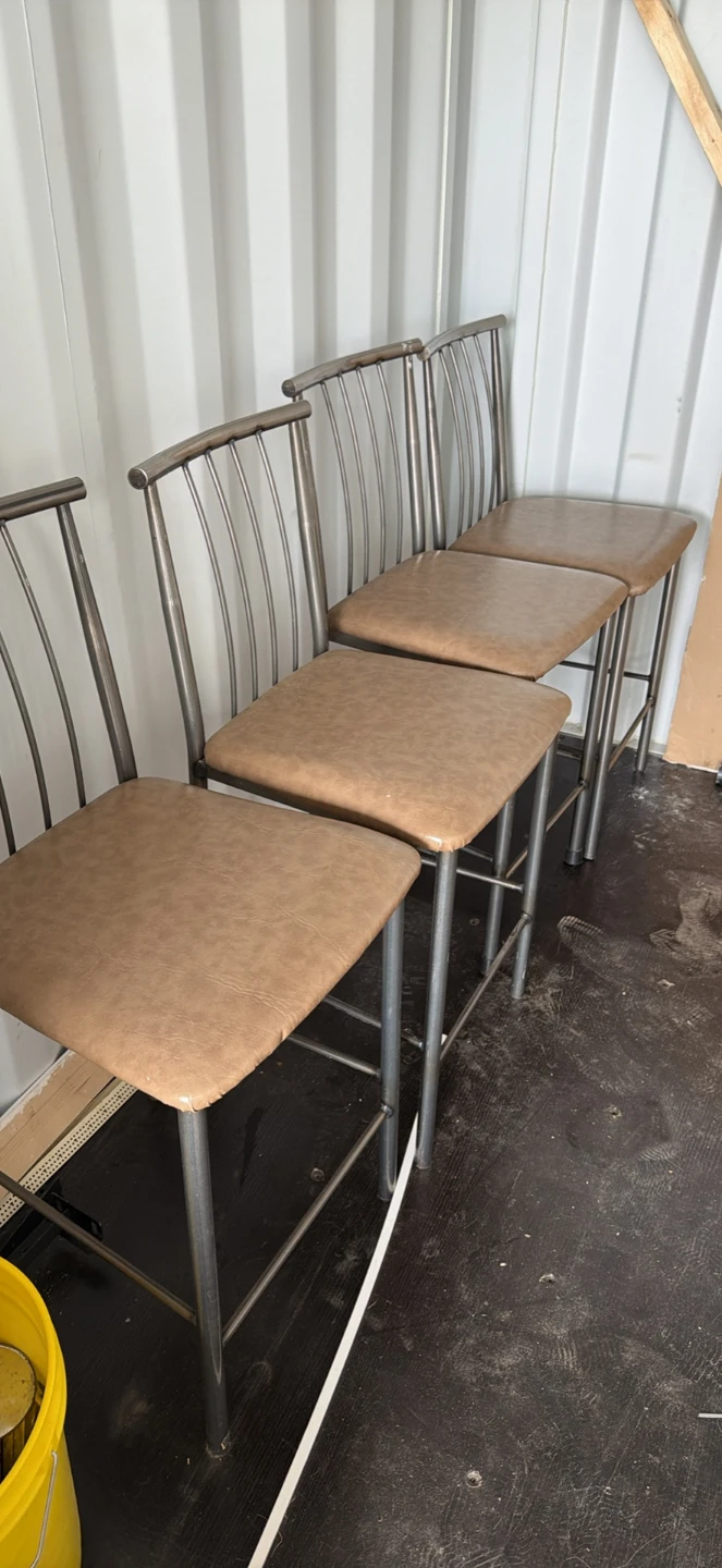 Set of 3 brown metal bar stools