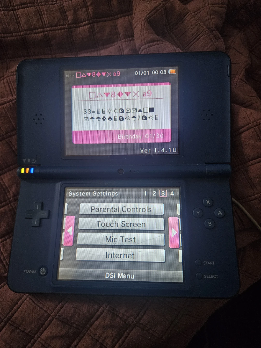 Nintendo DSi Blue with Super Mario 64 DS