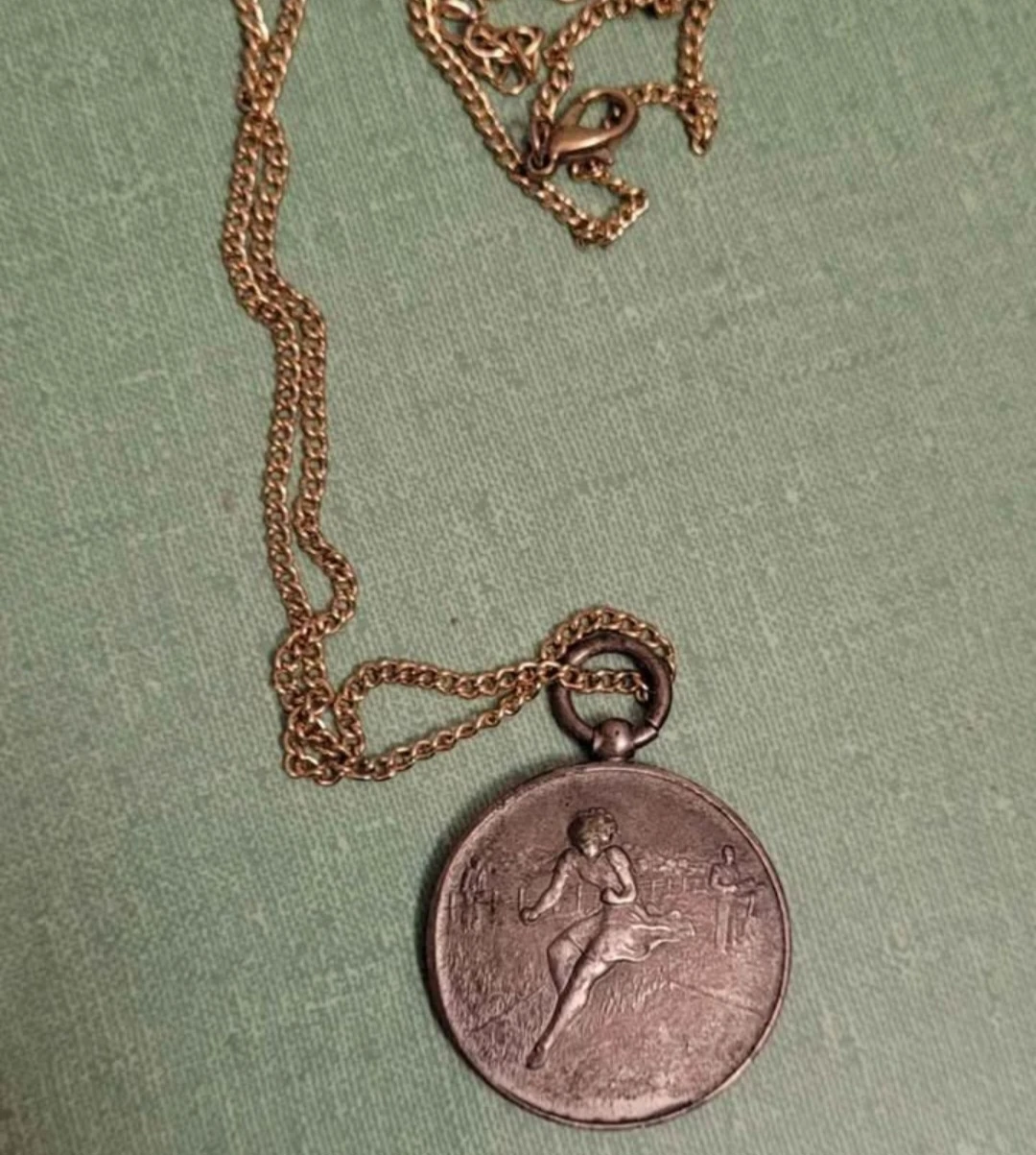 Vintage sports medal necklace