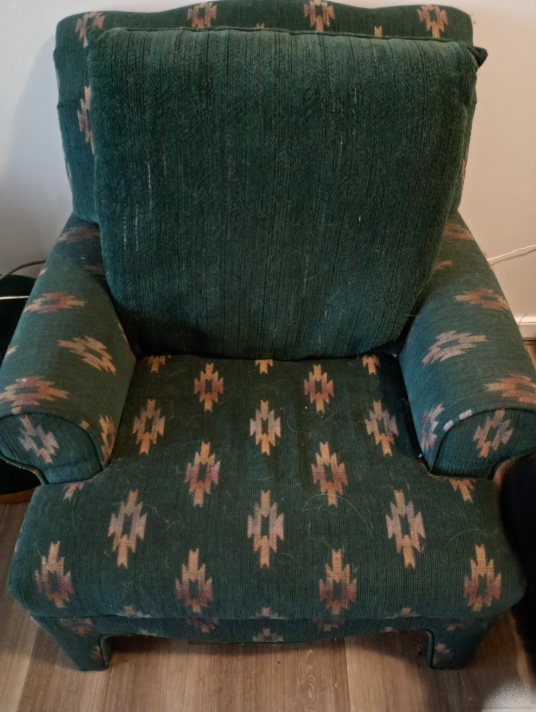 Green patterned armchair