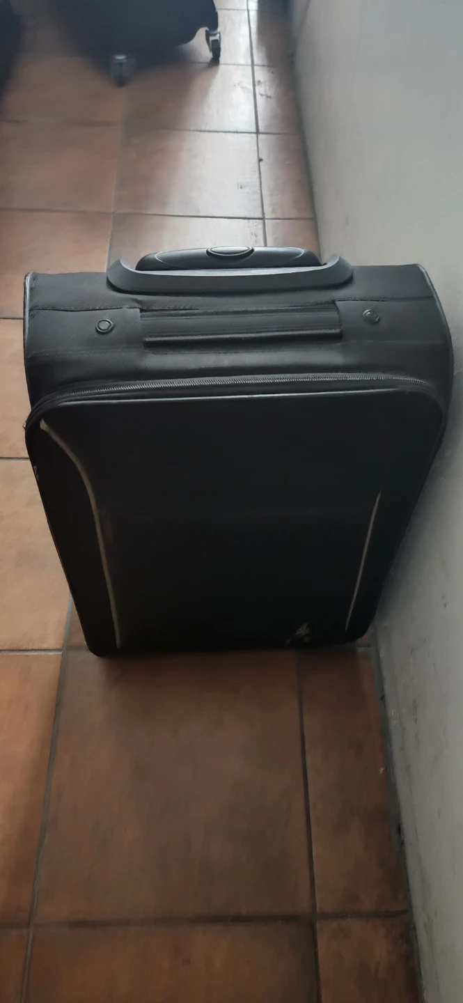 Black rolling suitcase - photo 2