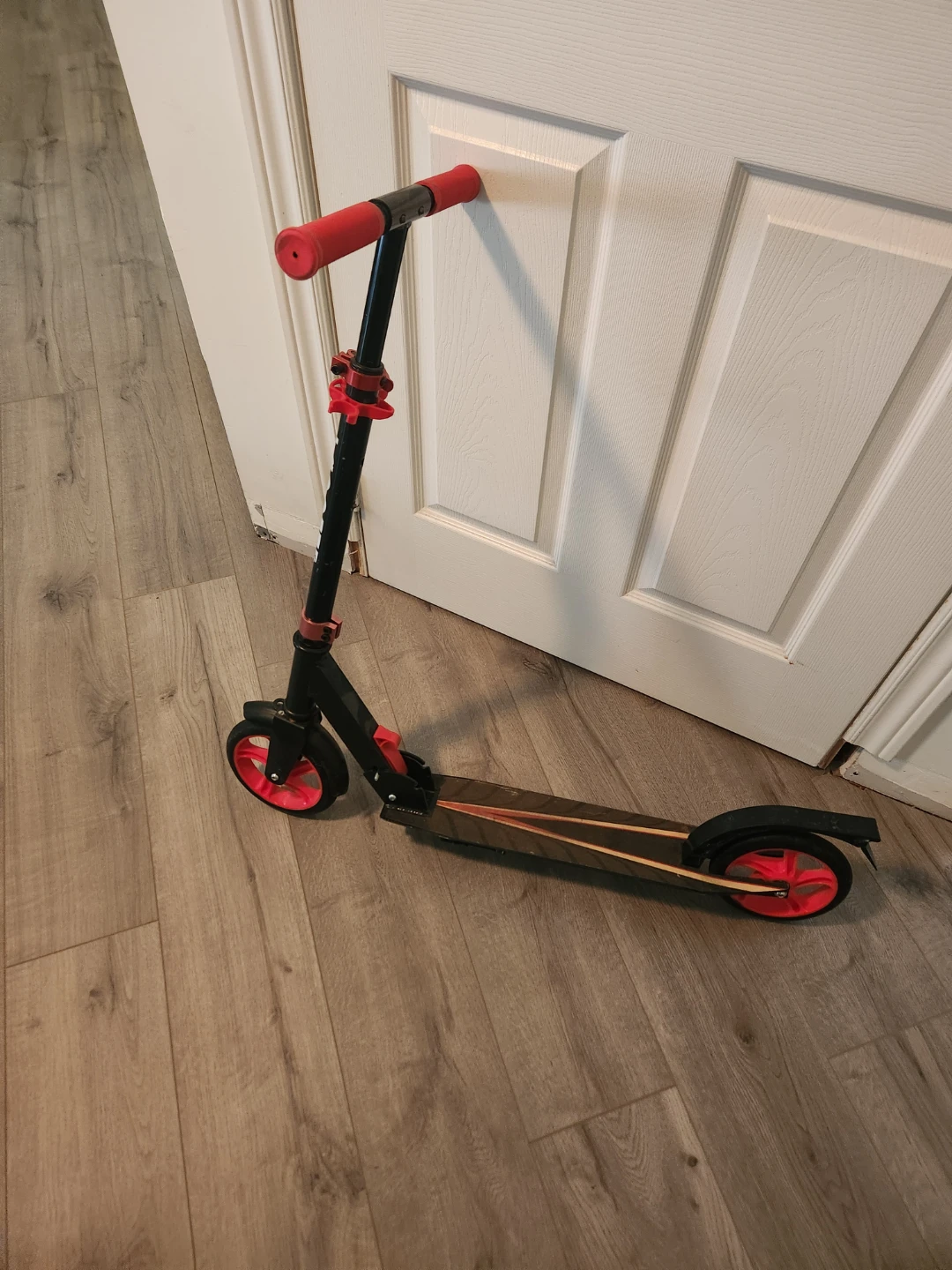 Black and red foldable kick scooter