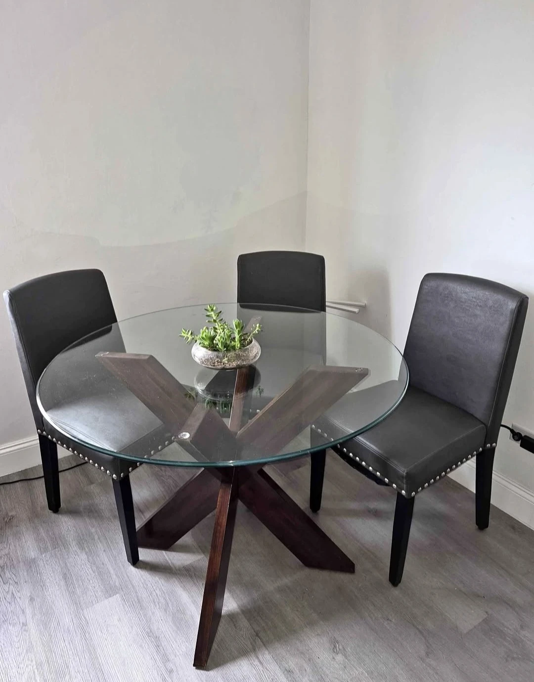 Like new Dining glass table with 3 chairs excellent condition