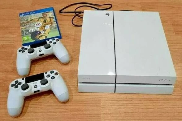 White Sony PlayStation 4 Console with 2 Controllers