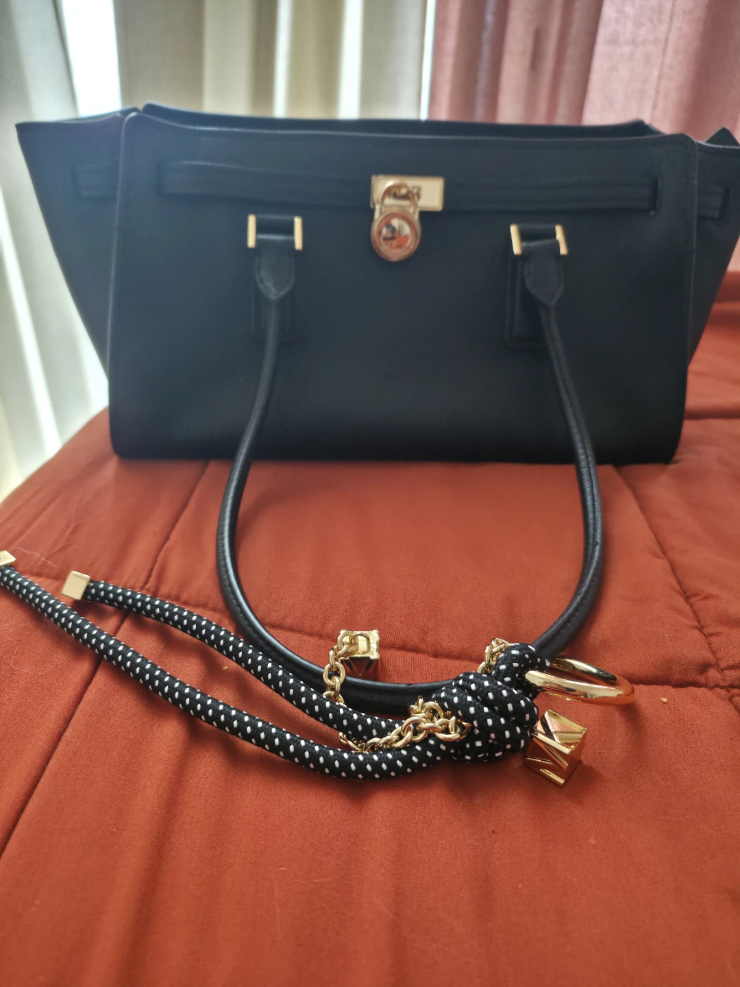 Michael Kors bag with charms