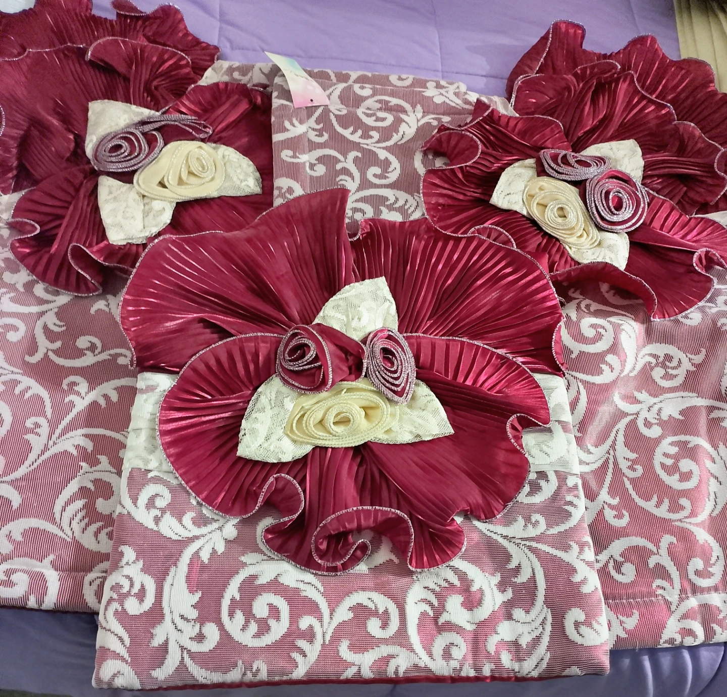 Decorative Burgundy Floral Cushion Covers, and the bed cover