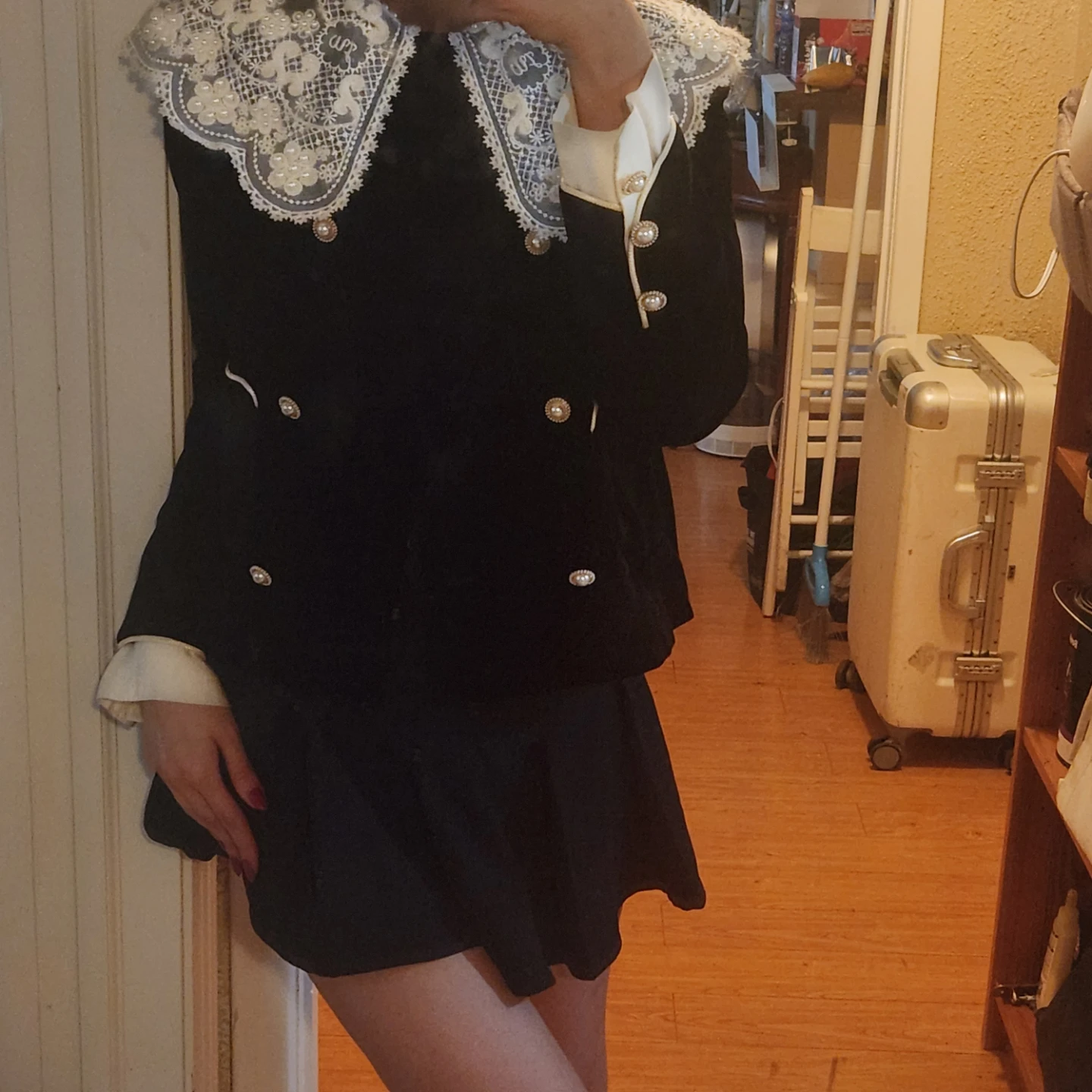 Black velvet jacket with pearl buttons