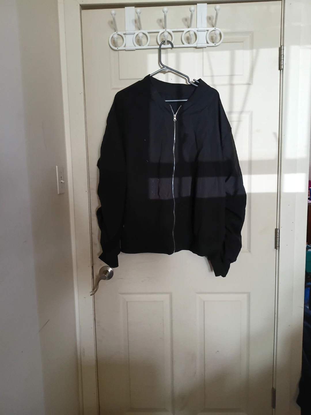 Black zip-up bomber jacket