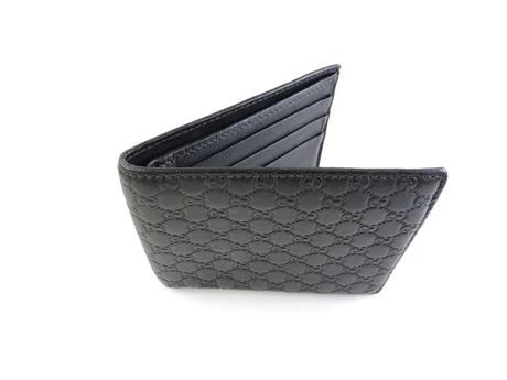 GUCCI Embossed Microguccissima Leather Bifold Wallet