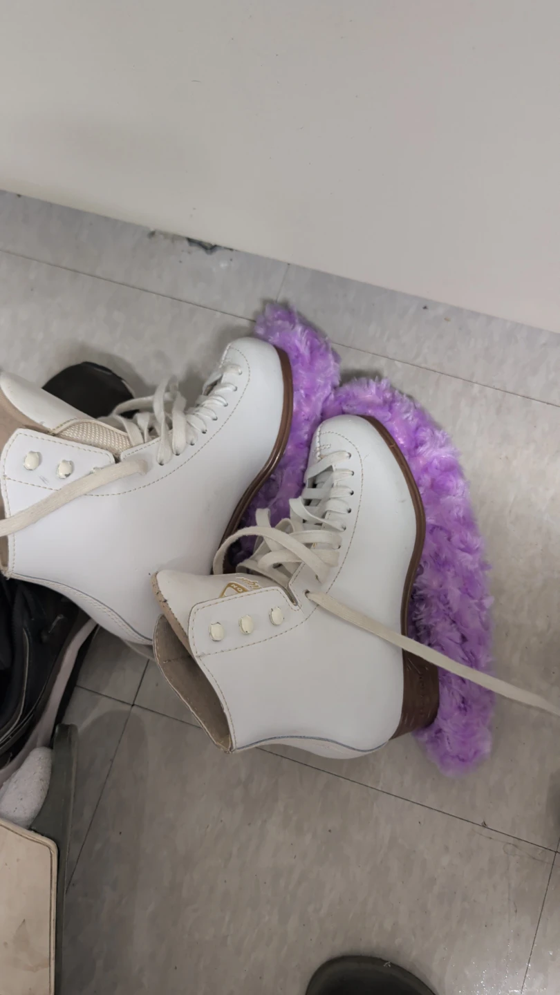 Jackson White Figure Skates with Purple Blade Covers