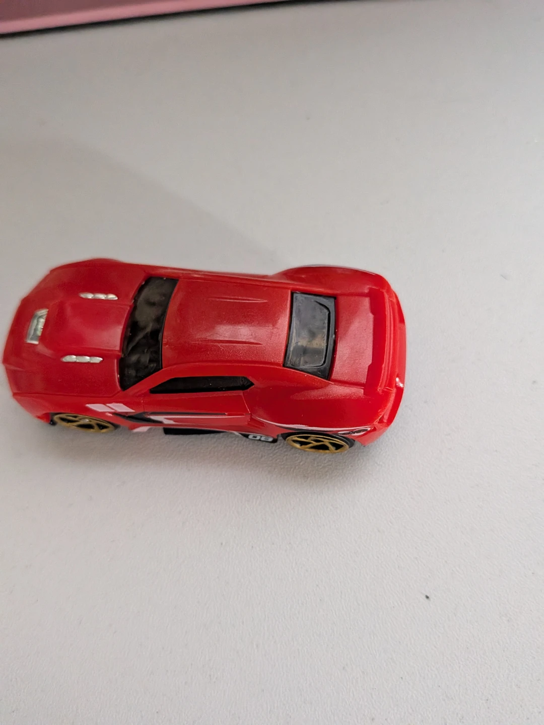 Hot Wheels red toy car