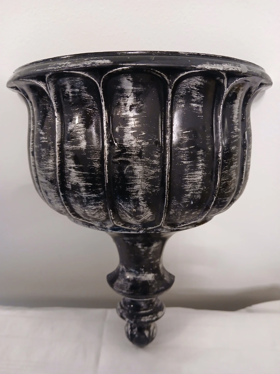 Black Wall-Mount Planter Urn. Fixed price.