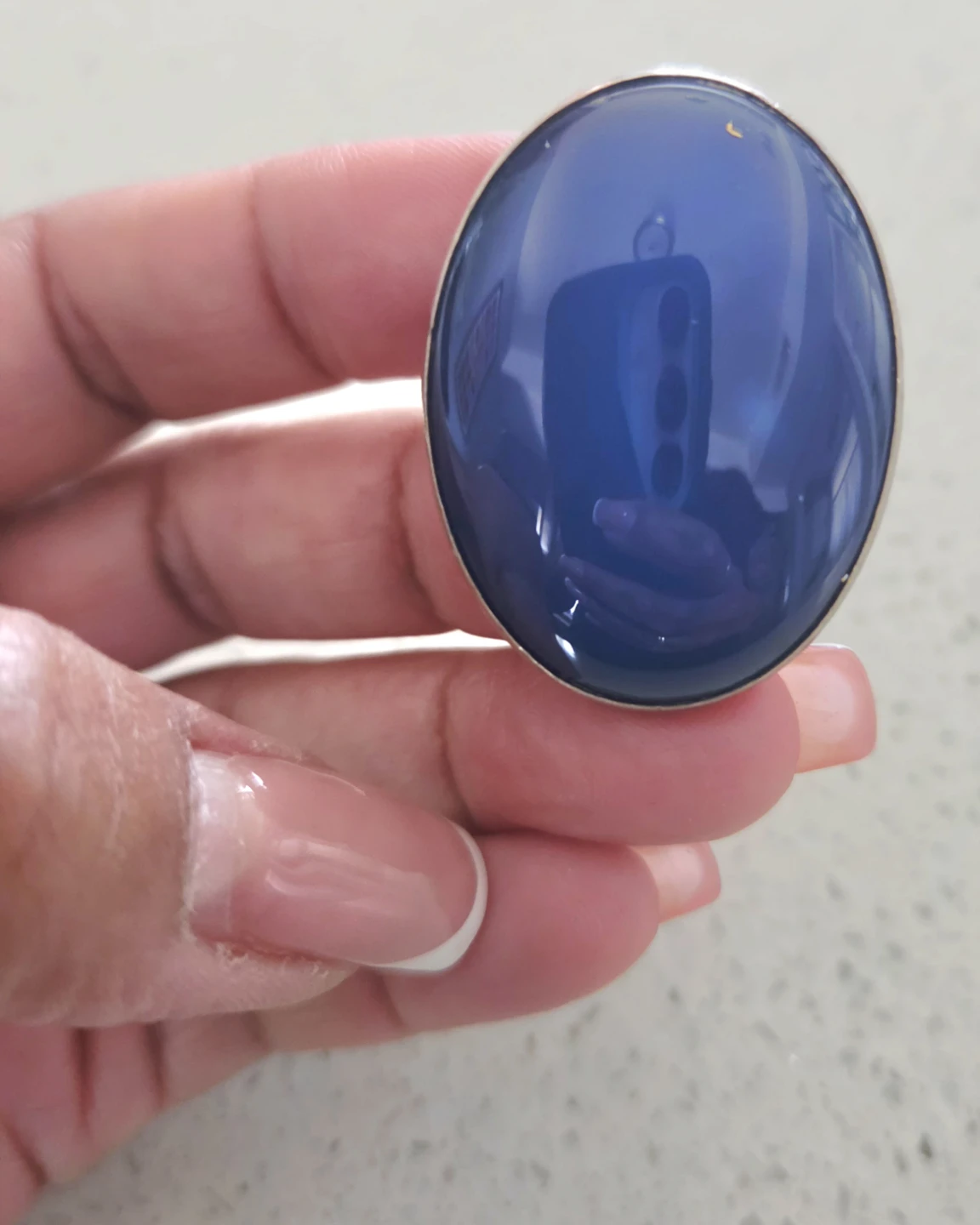 Oval blue stone ring