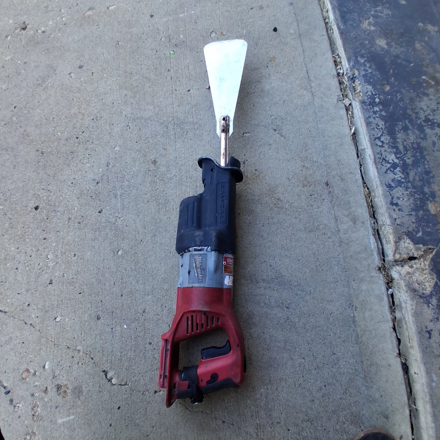 Milwaukee Sawzall Reciprocating Saw with Scraper Blade