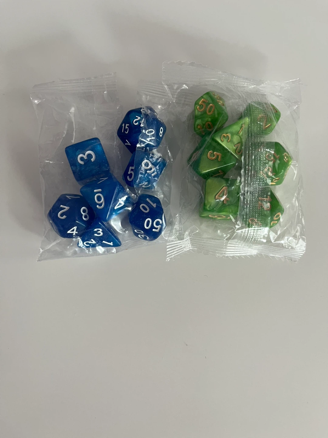 Two Sets of Polyhedral RPG Dice