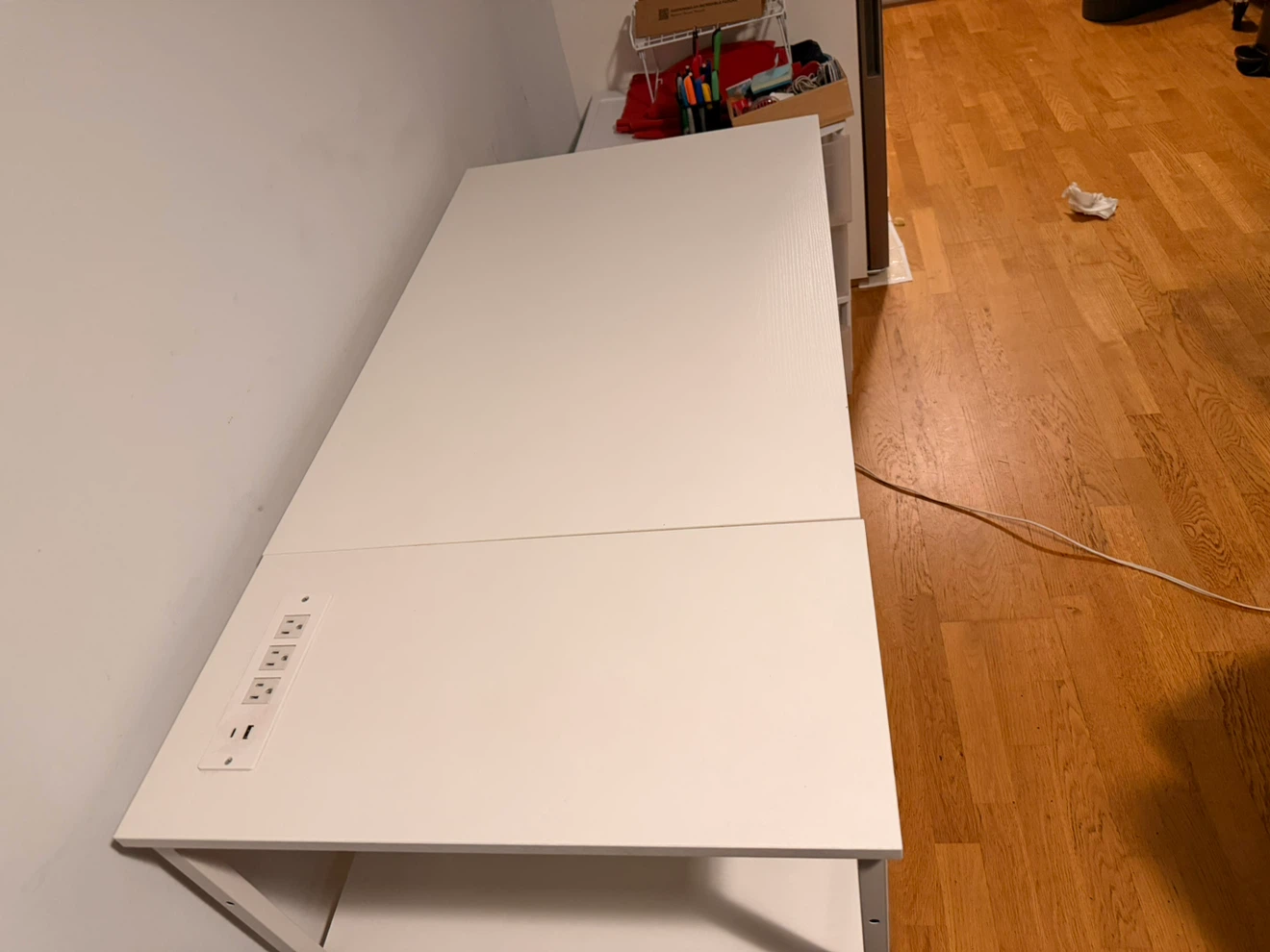 White desk with built-in power outlets and storage shelves - photo 2