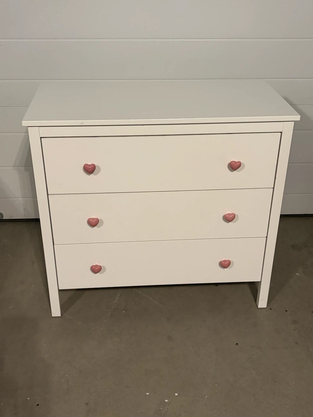 IKEA White dresser with pink heart knobs
