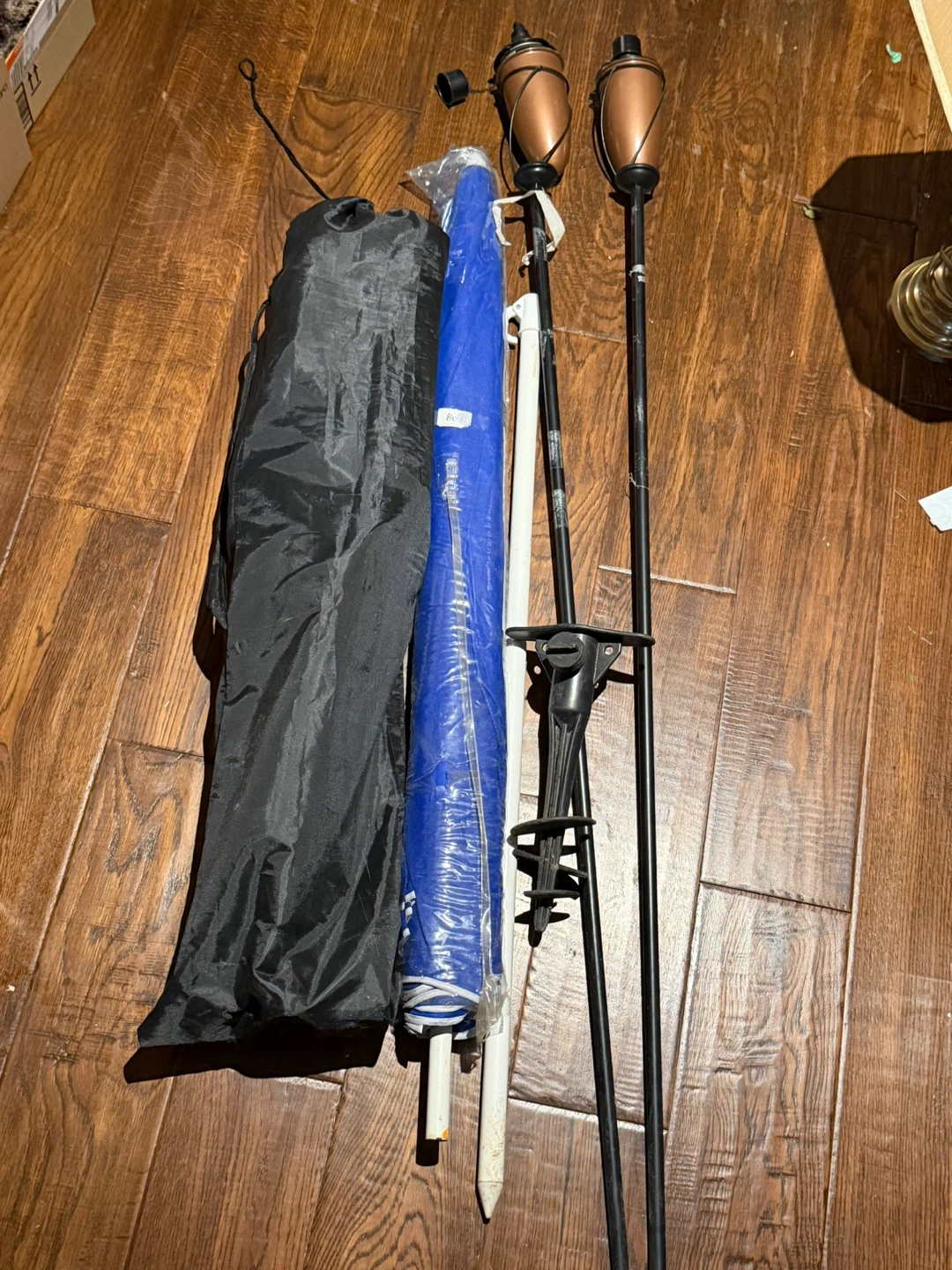Folding Green Camping Chair with umbrella and other stuff