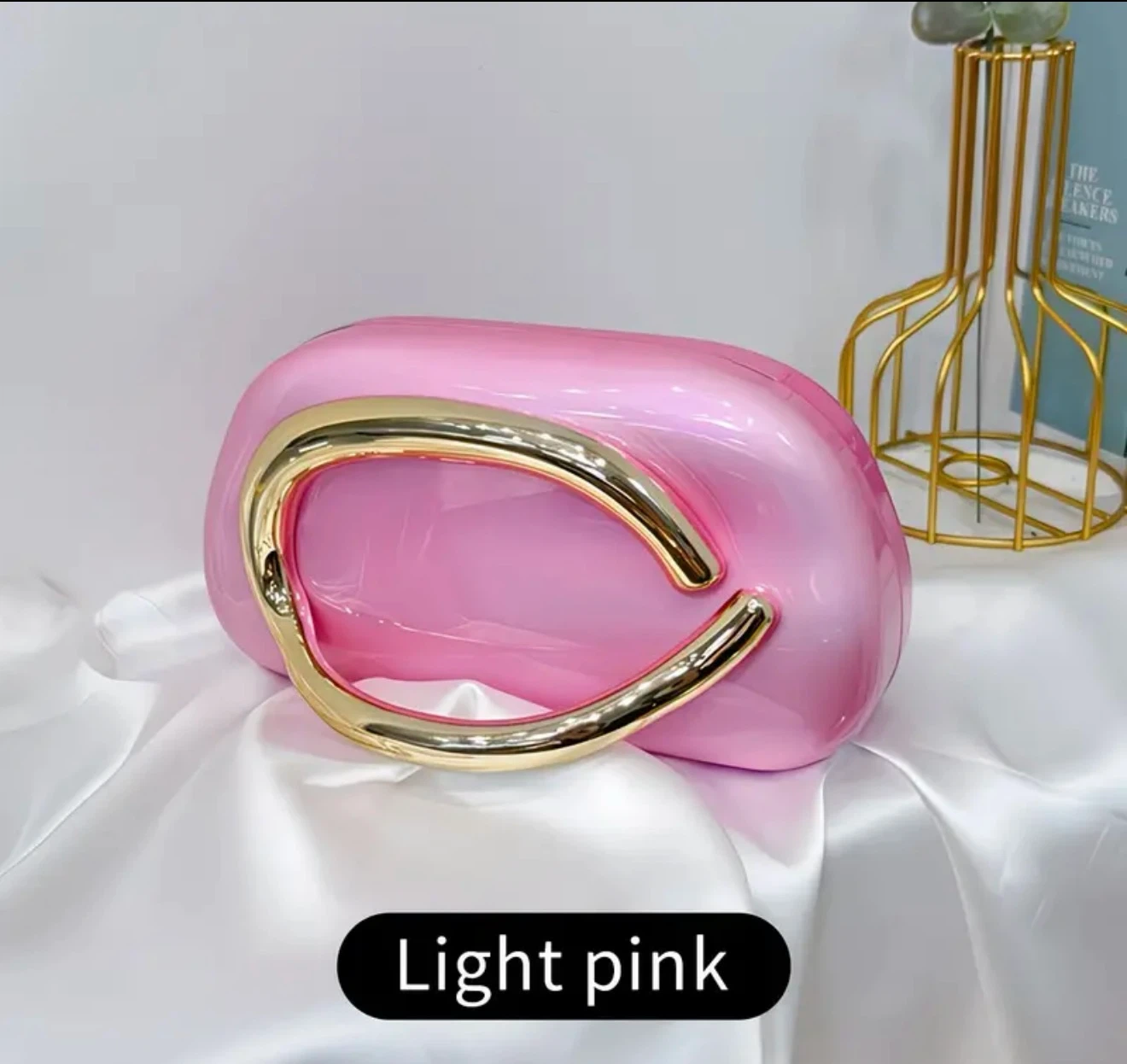 Light pink acrylic clutch bag