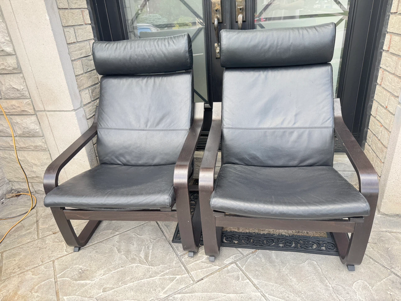 Two IKEA Poang Leather Armchairs