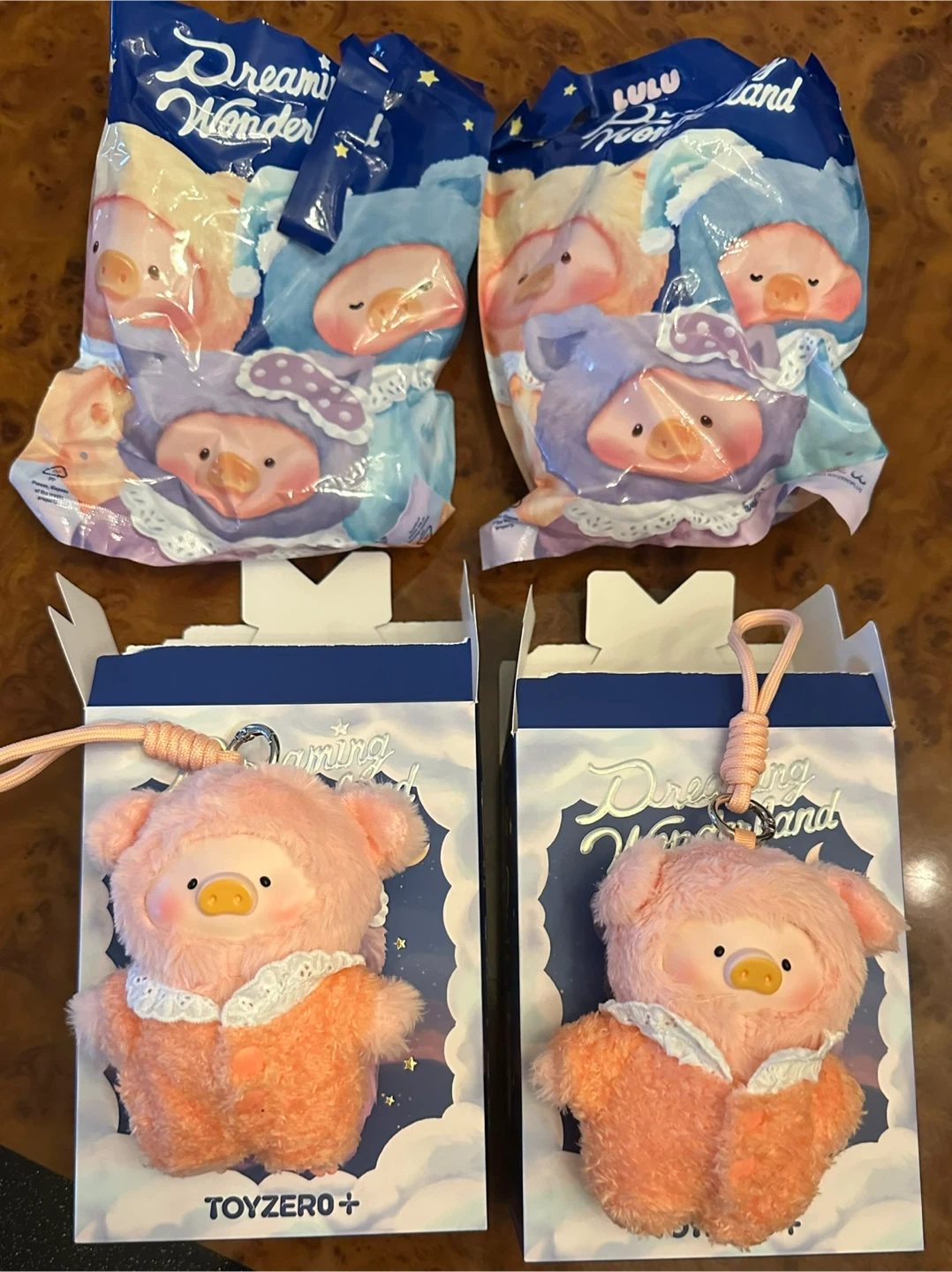 Two Lulu The Piggy Dreaming Wonderland Keychains