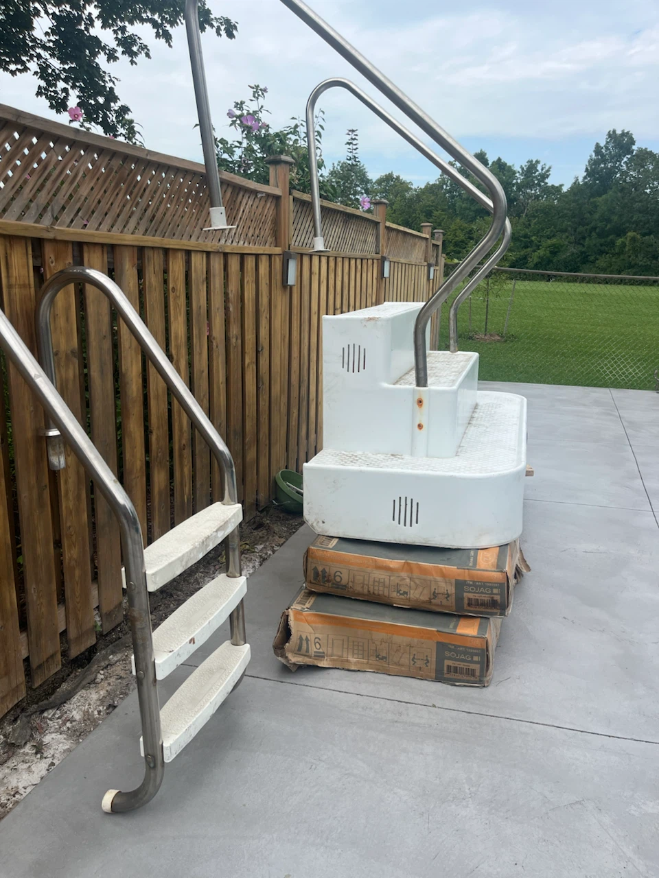 Pool stairs and stainless steel railings