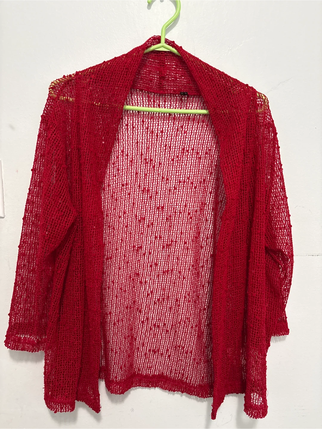 Red open knit cardigan