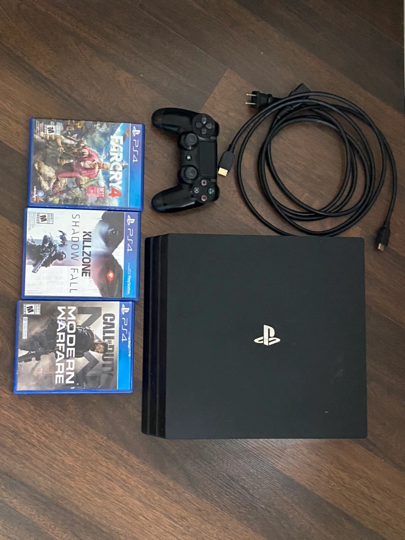 Sony PlayStation 4 Pro 1TB Console with Controller and 3 Games