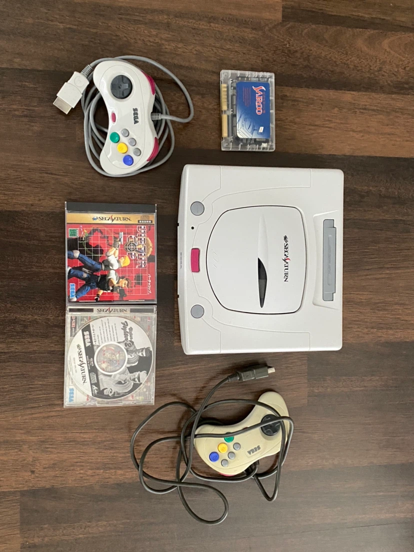 Sega Saturn Console with Controllers and Games