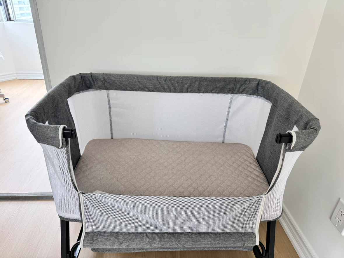 Brand new Grey Bassinet with Mesh Sides