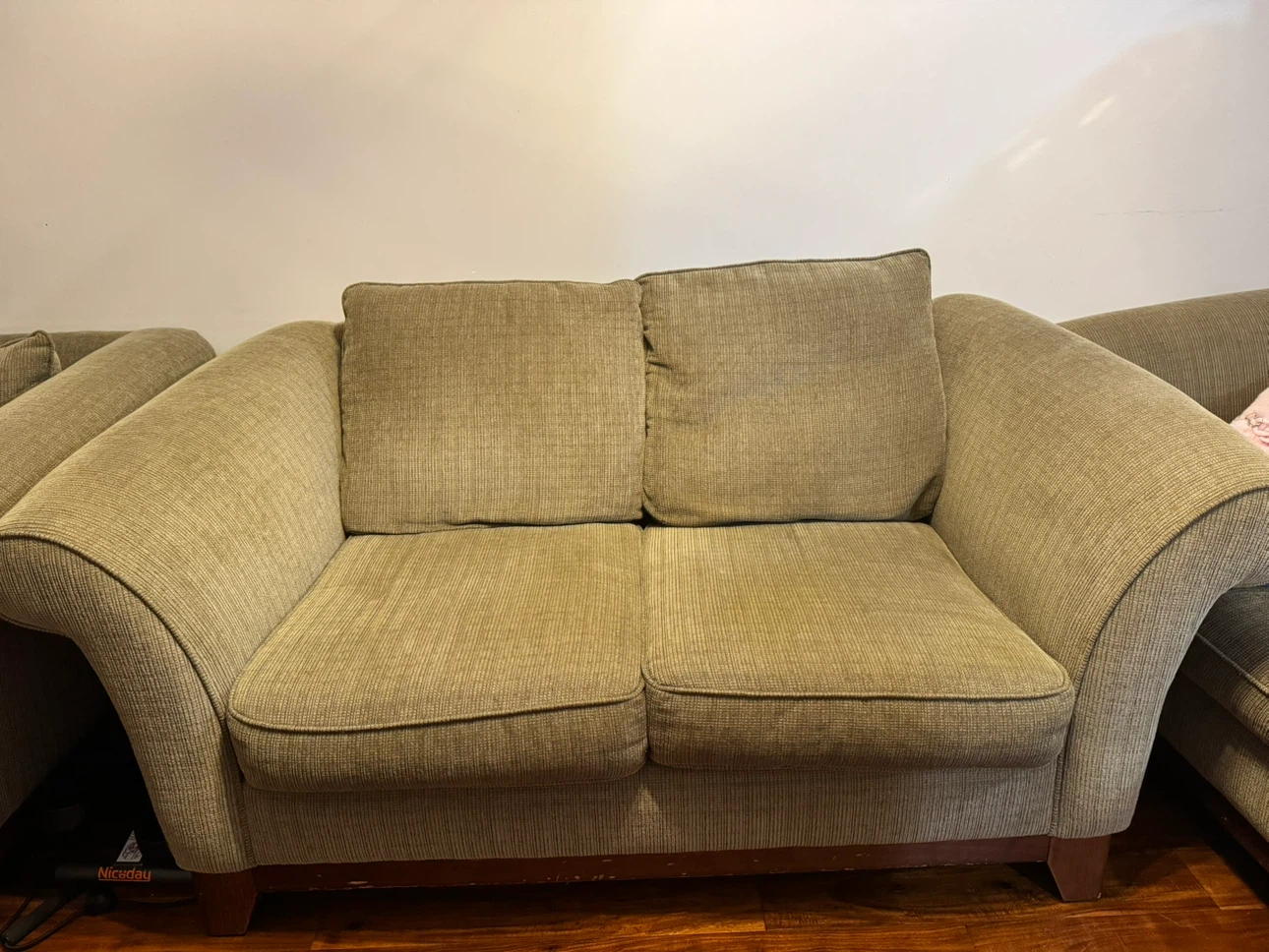 Two-seater fabric sofa