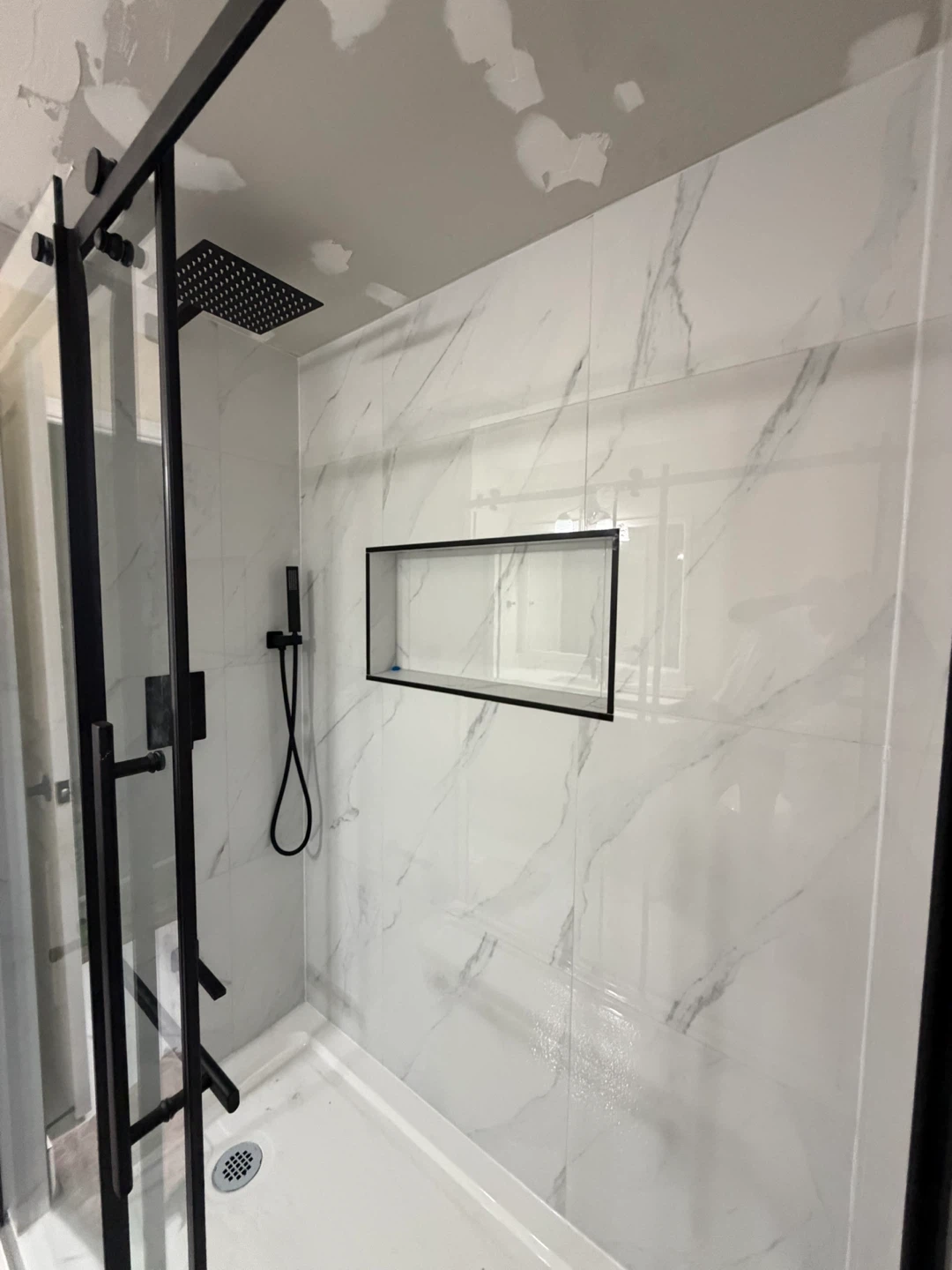 Renovated Bathroom Tile and Fixture Package