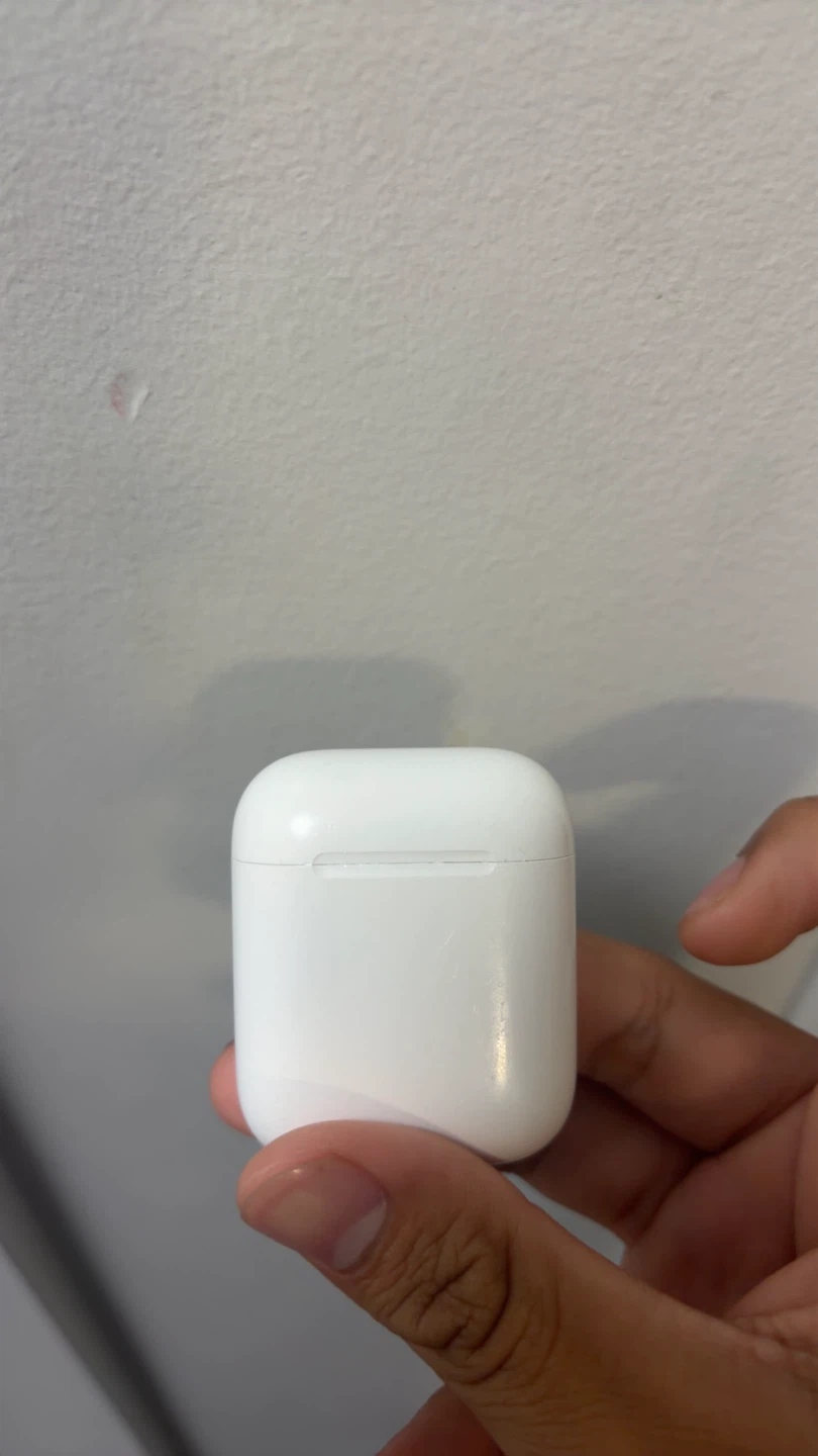 Apple AirPods (2nd Gen) with Charging Case - photo 2