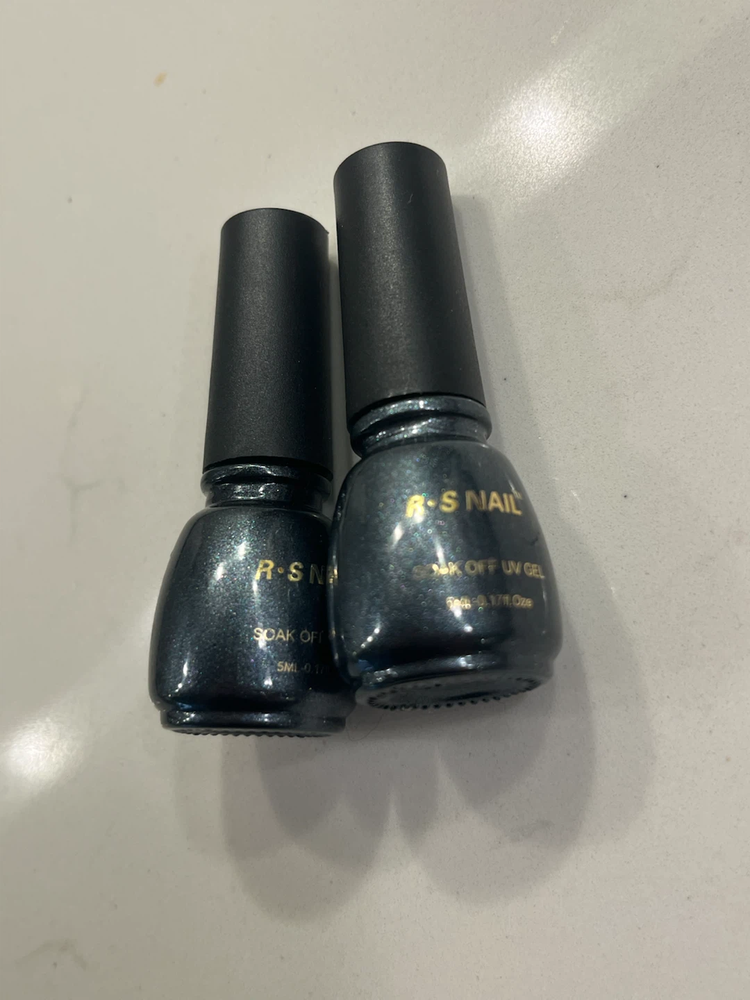 Two R.S. Nail Soak Off UV Gel Polish Bottles