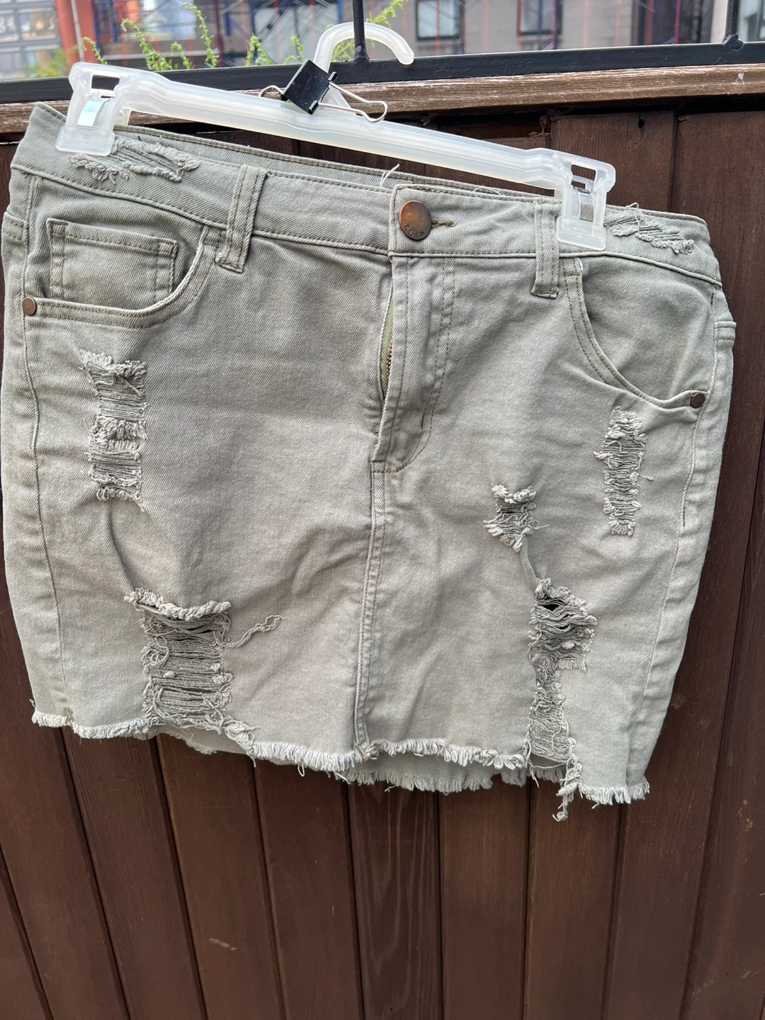 Elan Distressed Denim Mini Skirt
