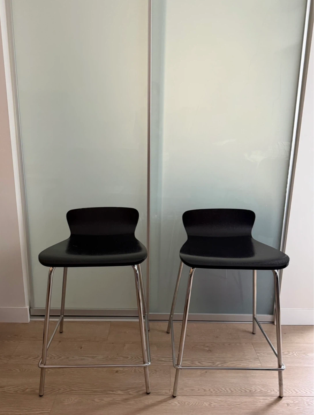 Crate and barrel - two black bar / counter stools
