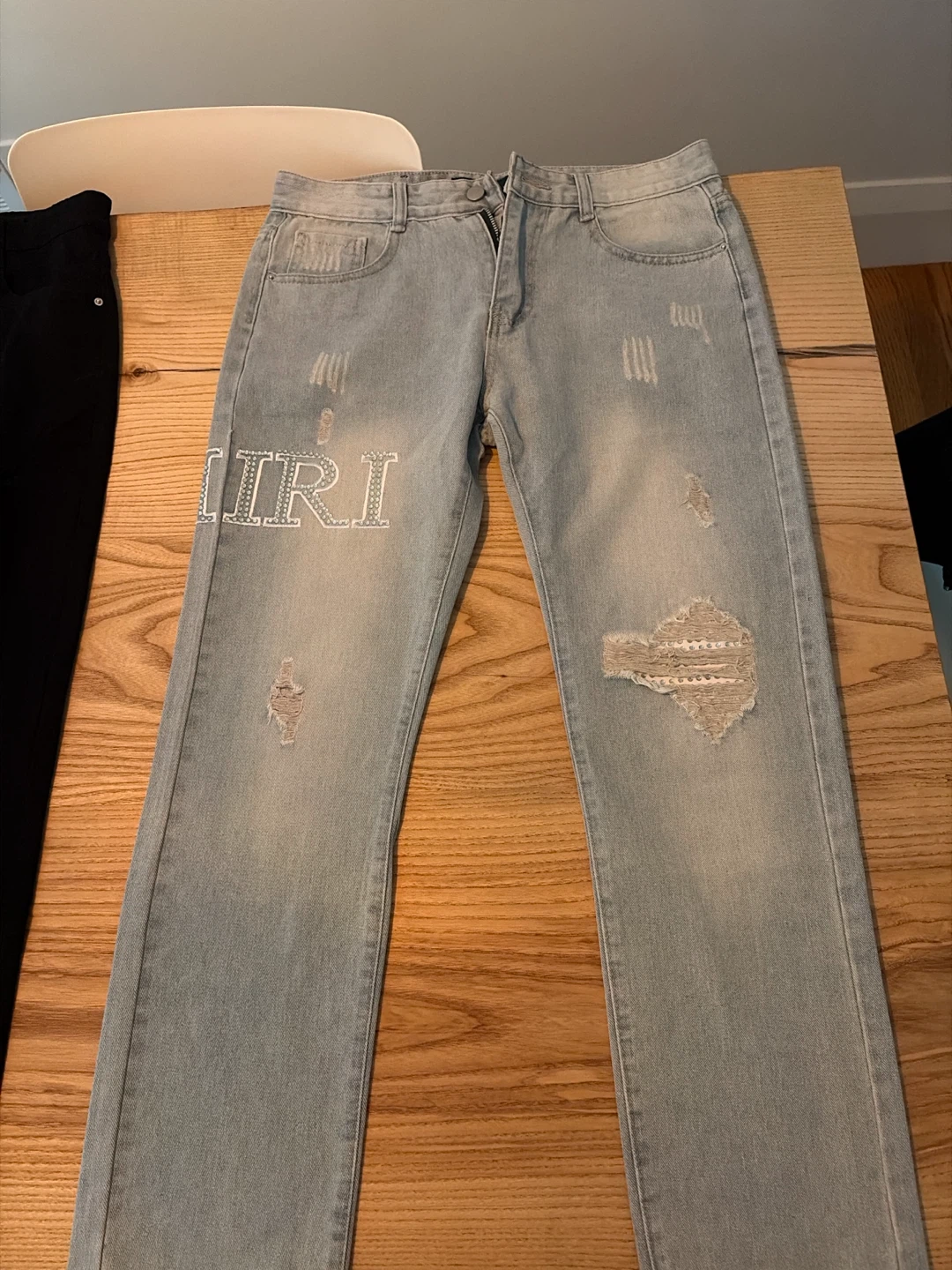 Amiri light wash denim jeans - photo 2