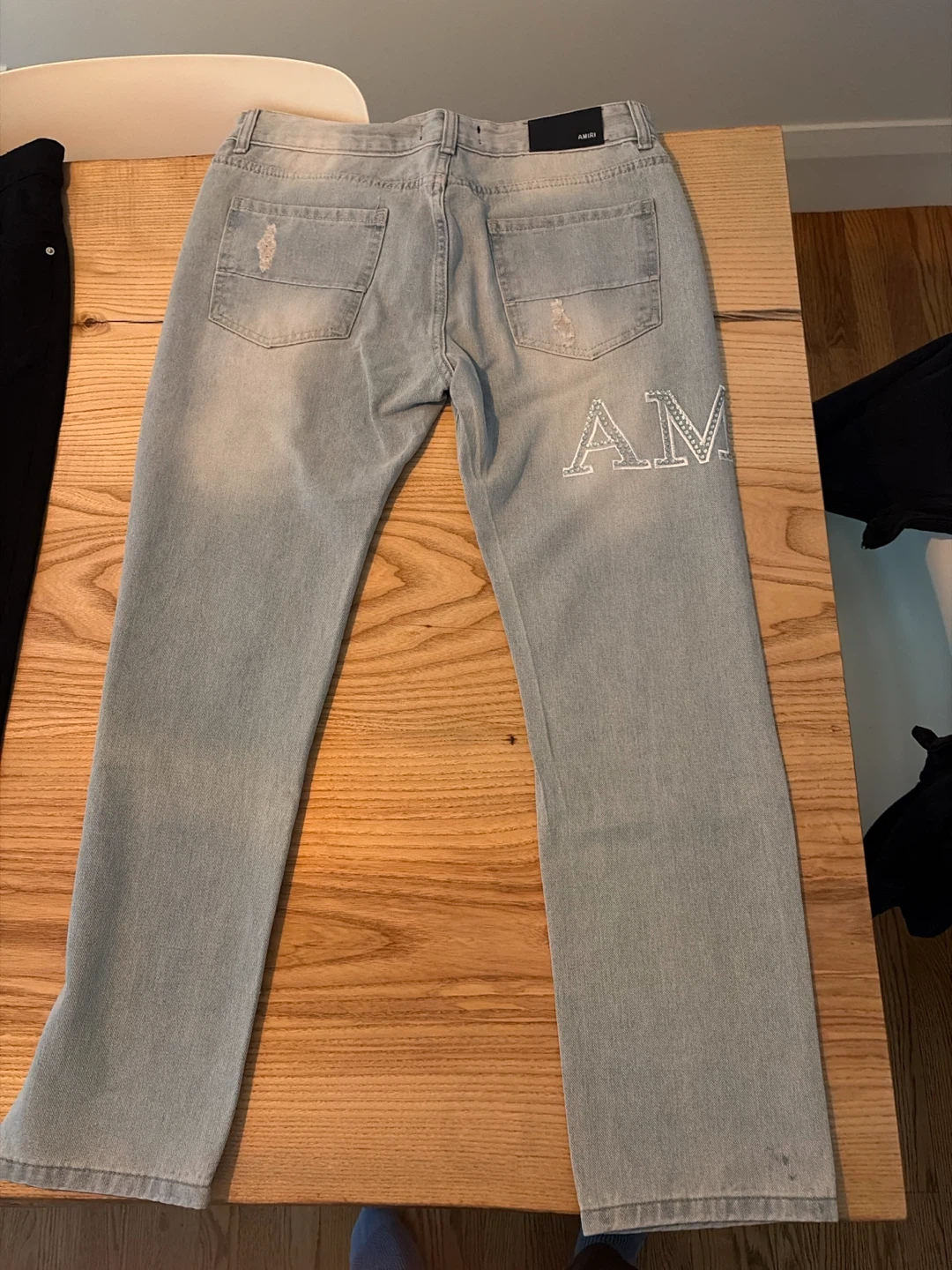 Amiri light wash denim jeans - photo 3
