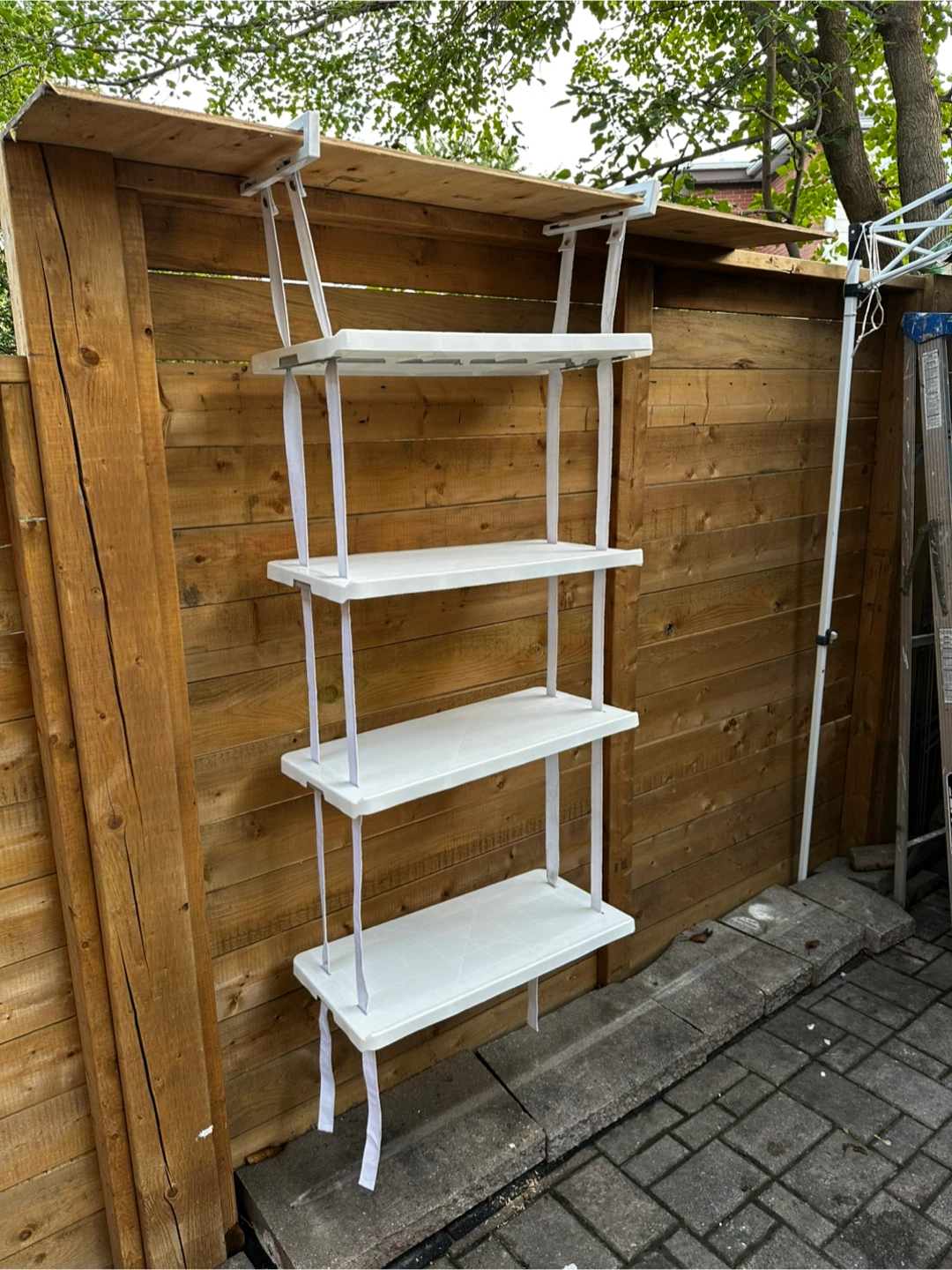 Over-the-door white 4-tier hanging storage shelving