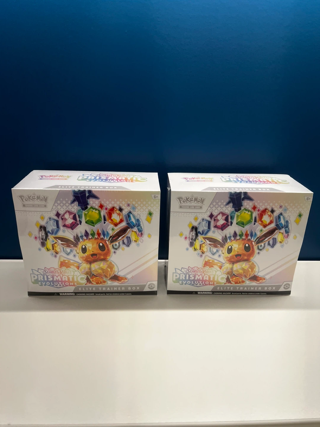 Prismatic Evolution ETB MINT