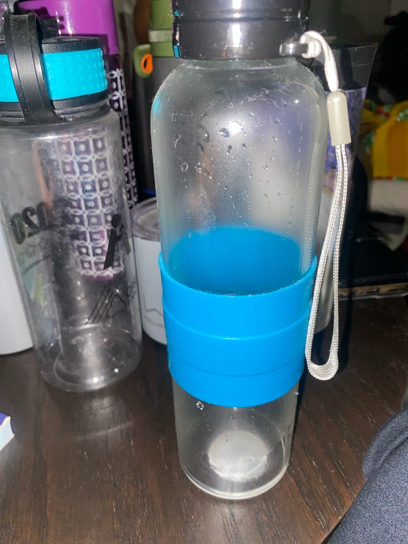Clear Plastic Water Bottle with Blue Grip