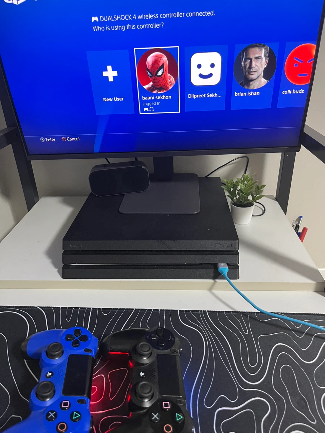 Sony PlayStation 4 Pro with Two Controllers also 5 games