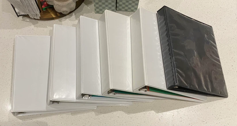 Lot of 6 Binders (5 White, 1 Black)